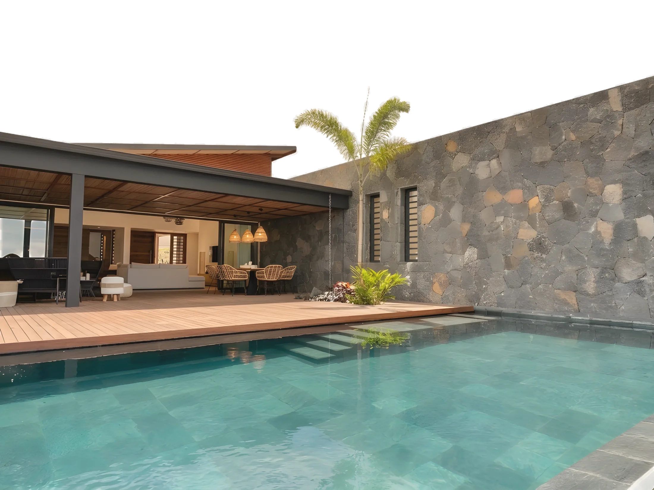 Villa des Sens: a basalt-walled pavilion above a turquoise infinity pool, a palm rising behind the roofline